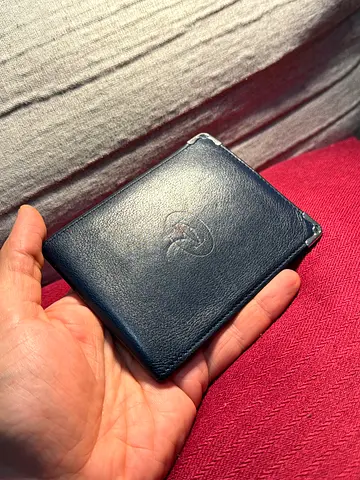Cartier navy leather bifold wallet — compact men's wallet