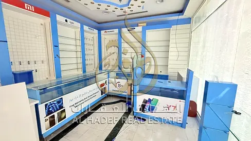 Commercial Shop in a Mixed-Use Tower in Al Majaz 3 | Ideal Business Location