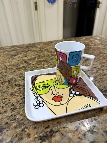 Set of colorful mugs and saucer - unused and new