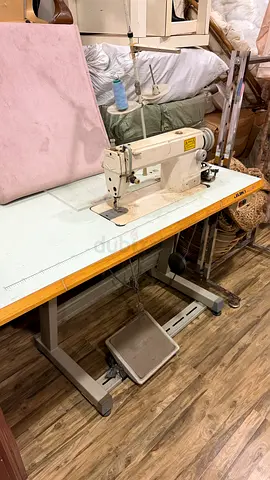 Industrial Juki Sewing Machine on Table with Motor and Pedal in a very good condition