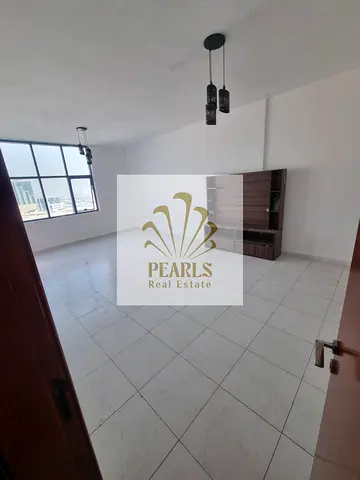 2-BEDROOM APARTMENT FOR ANNUAL RENT IN FALCON TOWERS, AL RASHIDIYA 2, AJMAN | 3 BALCONIES, 3 BATHROOMS, NO PARKING, 39,000 AED & 4 INSTALLMENTS