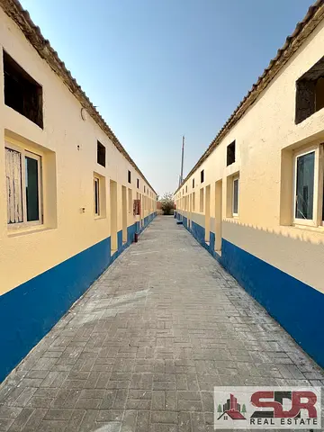 Labour Camp for Rent – Sajja, Sharjah * * Ejari Available 48 Rooms Available * Capacity: 10 Persons Per Room * Annual Rent: AED 51,600 Per Room * All-Inclusive * Ready to Move In