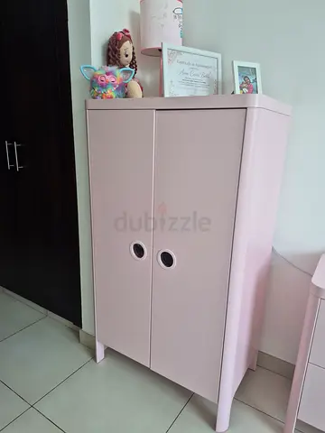 Light pink two-door cabinet / cupboard — compact storage for bedroom