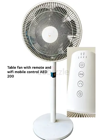 White standing table fan with remote and Wi‑Fi mobile control (AED 200)