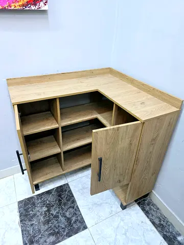 Oak finish corner storage cabinet with cubby shelves