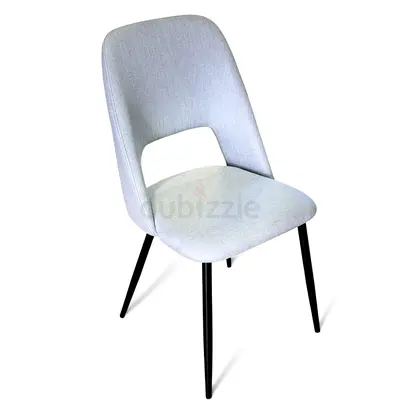 Modern light-grey upholstered dining chair with black legs