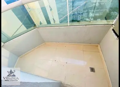 Resale studio apartment in Orient Towers, located in the Al Bustan area of Ajman, spanning 544 square feet. The unit features a spacious living are