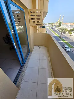 One-bedroom apartment with a living room and balcony available for annual rent in Al Butina. Ejari