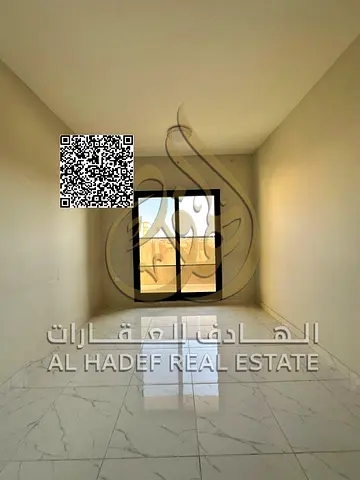 For rent in Al Rawda 1, Ajman, 1 bedroom and a living room, 2 bathrooms, balcony with open view and built-in wardrobe, near Al Hamidiya Police, 32,000