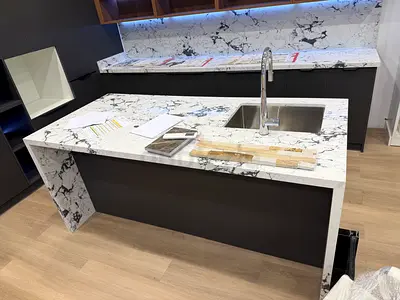 Custom made modern kitchen island with marble top quartz countertop and undermount sink