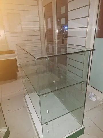 Glass Display Counter with Shelves — Good Condition