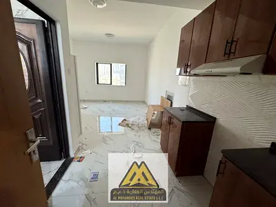 Studio in Al Alia, Ajman, semi-separated kitchen, split AC, easy access to Sharjah and Dubai. AED 22,005 yearly.