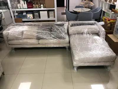 Light beige L-shaped sectional sofa with chaise - good condition