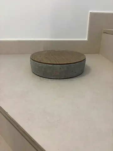 Round concrete storage holder with wooden lid - in a good condition.