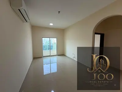 Spacious one-bedroom apartment with a living room and balcony, located in a vibrant area in Muwaileh 1.