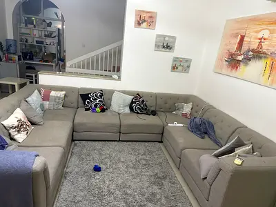 Large U-shaped grey fabric sectional sofa — good condition