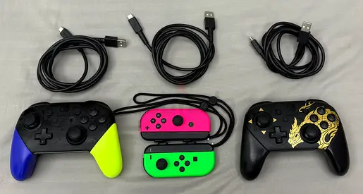 Nintendo Switch controllers bundle — 2 Pro Controllers + Neon Joy-Con + 3 charging cables