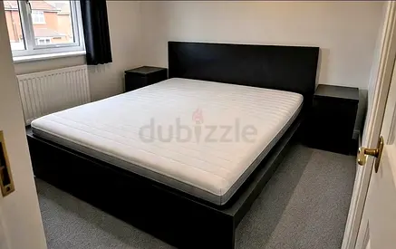 Ikea king size bed with mattress and storage drawers