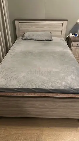 Single Bed Frame in Light Wood Finish. One mattress included.