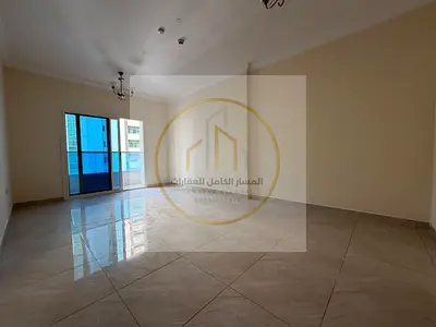 Annual Rental in Al Majaz 2: 3-Bedroom Apartment with Balcony, Open Panoramic View, Luxury Finishes, Second Occupancy, Laundry Room and Free Parking