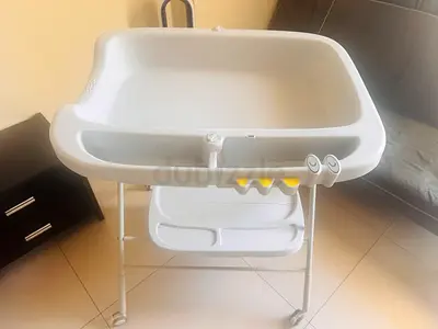 Baby bath tub with stand and storage - sturdy white unit, gently used