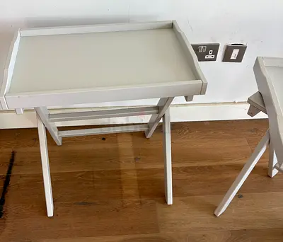 Pair of grey folding side tables with removable trays. L58cm W38 cm H 60 cm foldable tray comes off