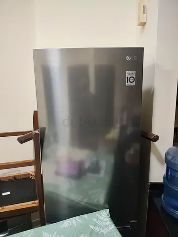LG double-door bottom mount freezer refrigerator in stainless steel finish - good condition