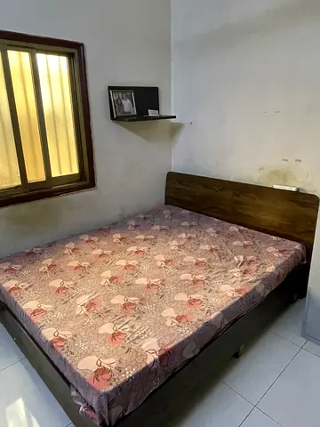 Queen and single size bed