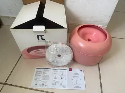 Cat drinking fountain