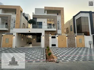 Villa for sale in Al Helio, Ajman. Features 5 master bedrooms, a majlis, a living area, a swimming pool, and a rooftop. Includes electricity, water, a