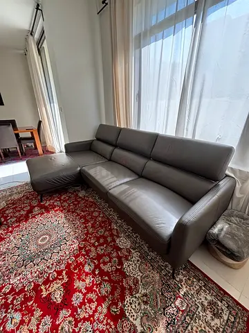 L-shaped, Grey leather 3-seater sofa in good condition