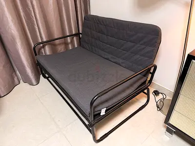 Compact 2-seater sofa/futon with metal frame - dark grey