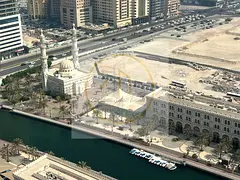 1BR in Al Qasba, Sharjah | Second Occupancy | 2 Balconies & Open Views | Gym, Pool, Free AC & Mainte