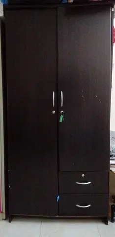 Two-door dark wood wardrobe with drawers, good condition