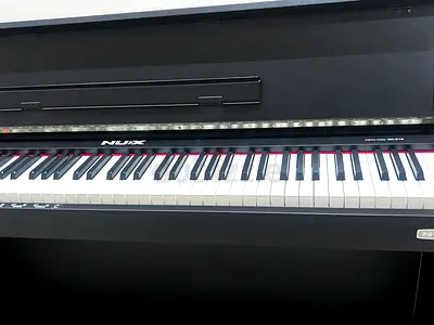 NUX digital upright-style keyboard / digital piano - good condition