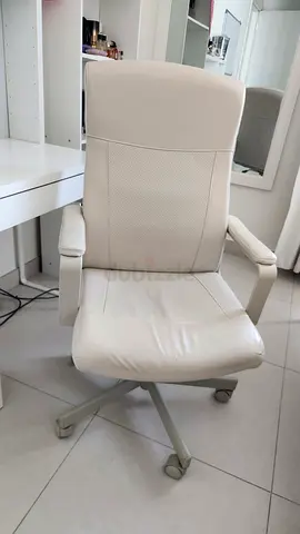 White swivel office chair with armrests and wheels - good condition