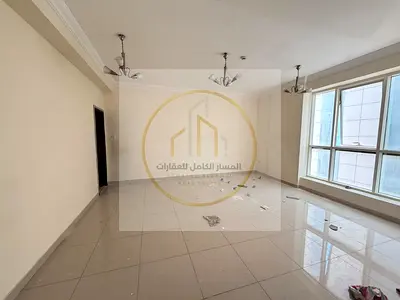 2BR apartment for annual rent in Al Majaz 2 Sharjah with free parking built in wardrobes panoramic view spacious layout and prime location
