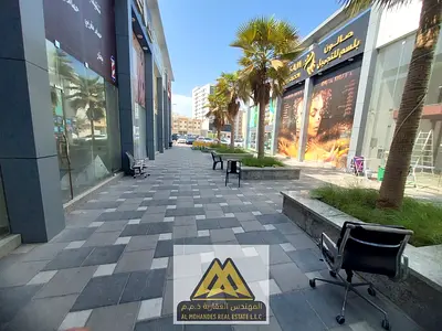 3 shops with mezzanine in Al Hamidiya, Ajman, 1,249 sq ft total. AED 32K each or AED 90K yearly for all.