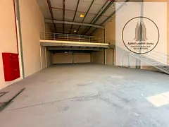 Warehouse on a main street, 5,000 square feet, with a mezzanine.