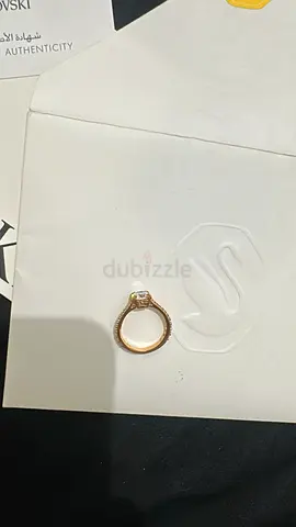 Gold ring with clear round stone — size 7 orginal swarovski