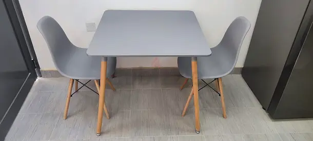 Grey Square Dining Table with 2 Eames-Style Chairs