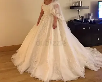 Ivory Lace Ball Gown Wedding Dress with Long Train - Size Approx UAE