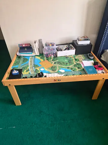 Wooden Train Table with Play Mat — Good Condition. Good for building lego