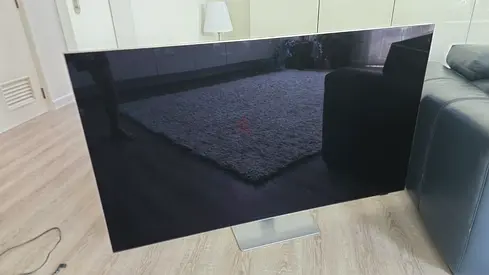 55-65" Flat Panel TV - Slim Design. Without remote control as it broke.