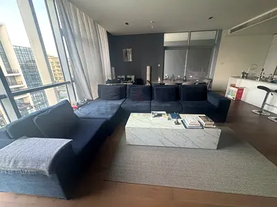 Large L-shaped navy fabric sectional sofa - modern, good condition