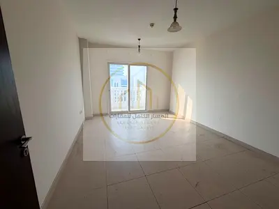 Spacious 2-Bedroom Apartment for Annual Rent in Al Majaz 1 with Balcony, Sea View, 3 Bathrooms, Laundry Room, Free AC, Gym, Pool & Parking
