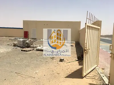 For rent 2 walled land in Sharjah, Al Sajaa area S