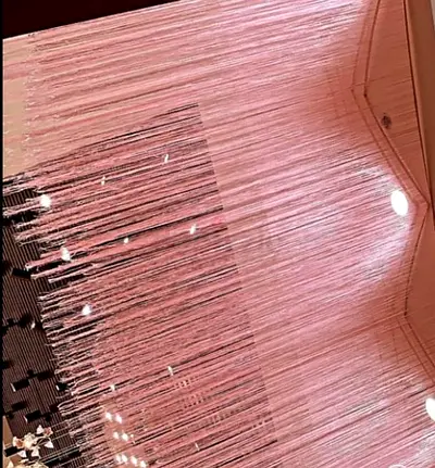 Light pink string fringe curtain / room divider - good condition
