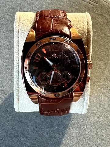 Brown leather men's wristwatch with chronograph-style dial