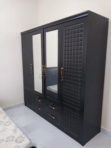 Dark wood 3-door wardrobe with mirror and drawers - good condition
